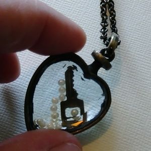 Heart shape necklace with key and floating pearls
